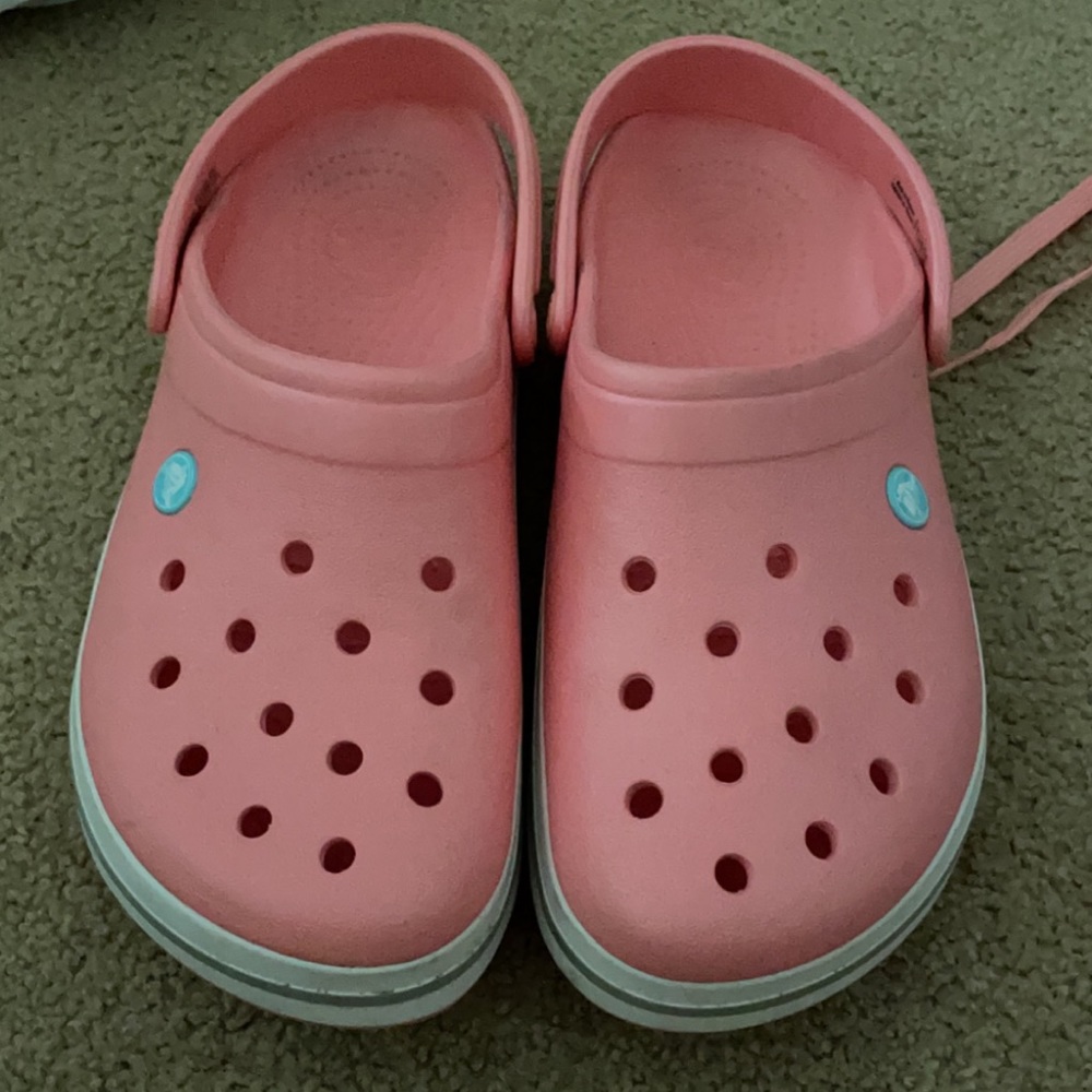 Pink classic crocs size W 9